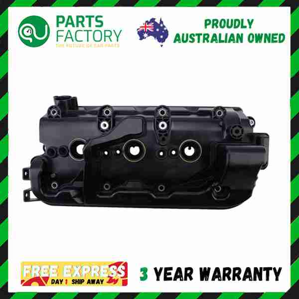 Left Amarok 3.0L V6 rocker cover showing its injector openings and mounting points, without a round breather cap